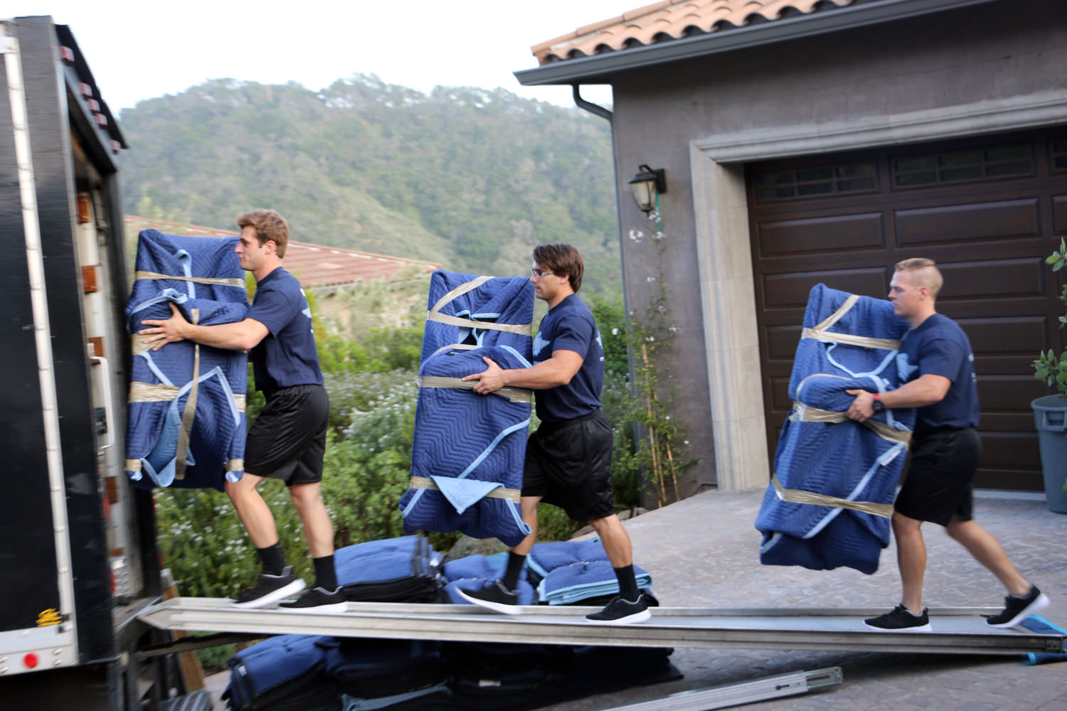 Seattle's Best Movers crew loading a moving truck